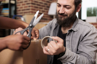 Portrait of young man working in workshop