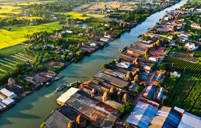 High angle view of river amidst buildings in city