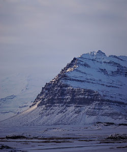 Scenic view of sea against sky during winter