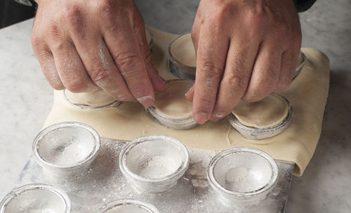 High angle view of man preparing food