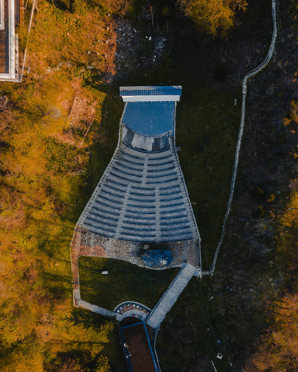 HIGH ANGLE VIEW OF PARK DURING AUTUMN