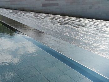 High angle view of wet swimming pool