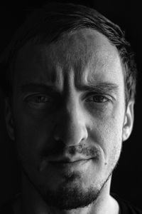 Close-up portrait of smiling mid adult man