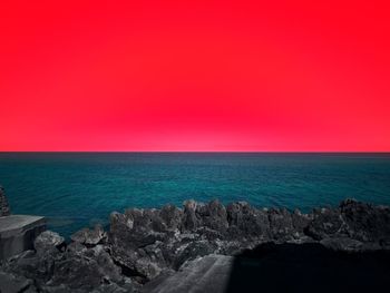 Scenic view of sea against clear sky