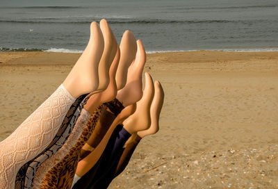 Low section of woman on beach