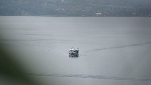 Boat sailing in sea