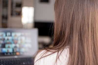 Close-up of a girl having an online meeting