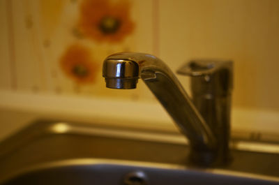 Close-up of faucet in kitchen