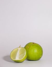 Close-up of fruits against white background