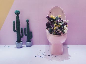 Close-up of flower pot on table