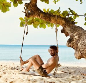 Portrait of young man on beach