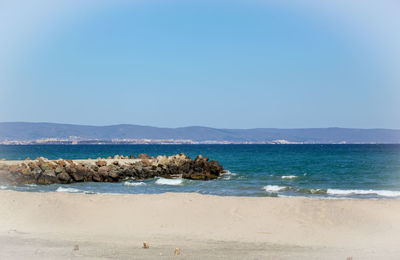 Scenic view of sea against clear sky