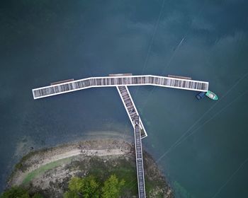 Low angle view of electricity pylon against sky