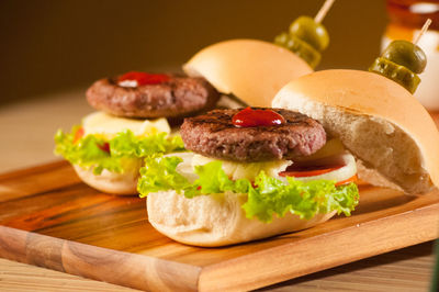 Close-up of served food in plate on wooden table