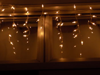 Close-up of illuminated light bulb