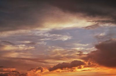 Low angle view of cloudy sky during sunset