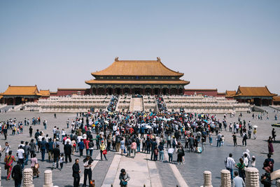 People in front of historical building