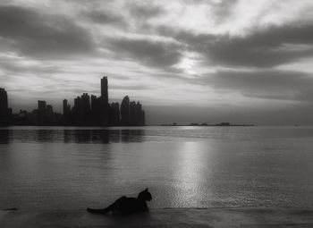 Scenic view of sea against cloudy sky