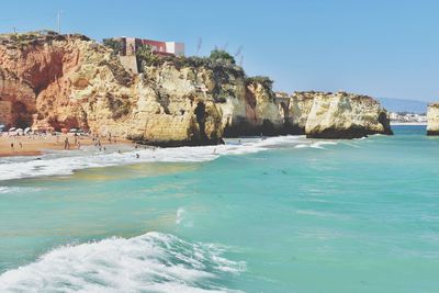 Scenic view of sea against clear blue sky