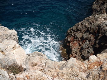 High angle view of rocks on beach