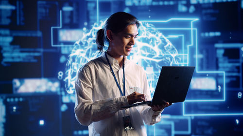 Young woman using digital tablet
