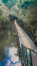 High angle view of footbridge over river