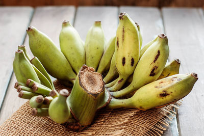 Close-up of bananas on wooden table