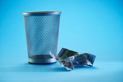 Close-up of blue tea against white background