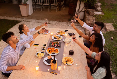 High angle view of people sitting at table