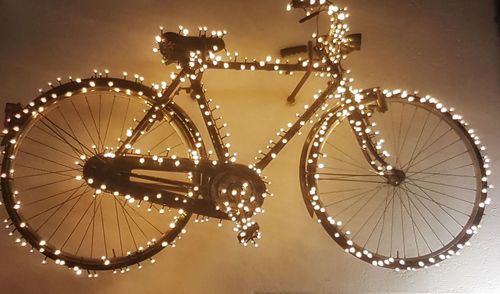 Low angle view of illuminated ferris wheel