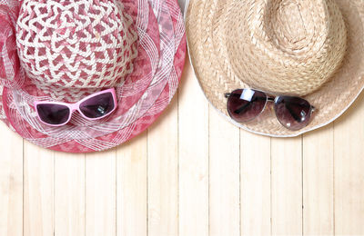 High angle view of sunglasses on hat