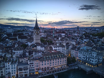 Cityscape against sky during sunset