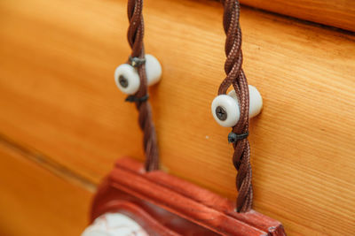 Close-up of chain hanging on rope