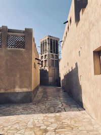 Alley amidst buildings in city