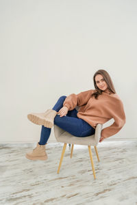 Woman sitting on chair