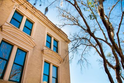 Low angle view of building against blue sky