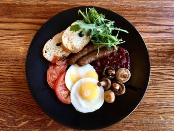 Directly above shot of breakfast served in plate on table