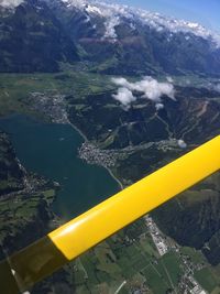 Aerial view of yellow and mountains against sky