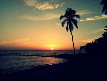 Scenic view of sea at sunset