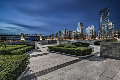 Modern buildings in city against sky