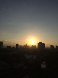 View of cityscape at sunset