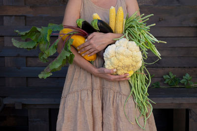 Eco-friendly concept with organic farm vegetables. fresh raw cauliflower, beans, zucchini, corn