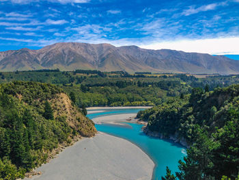 Scenic view of swimming pool against mountains