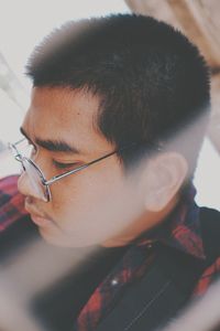 Close-up portrait of boy looking away