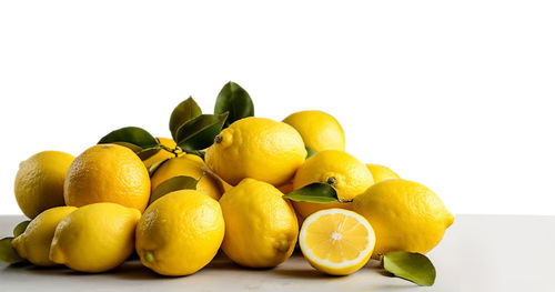 Close-up of oranges against white background