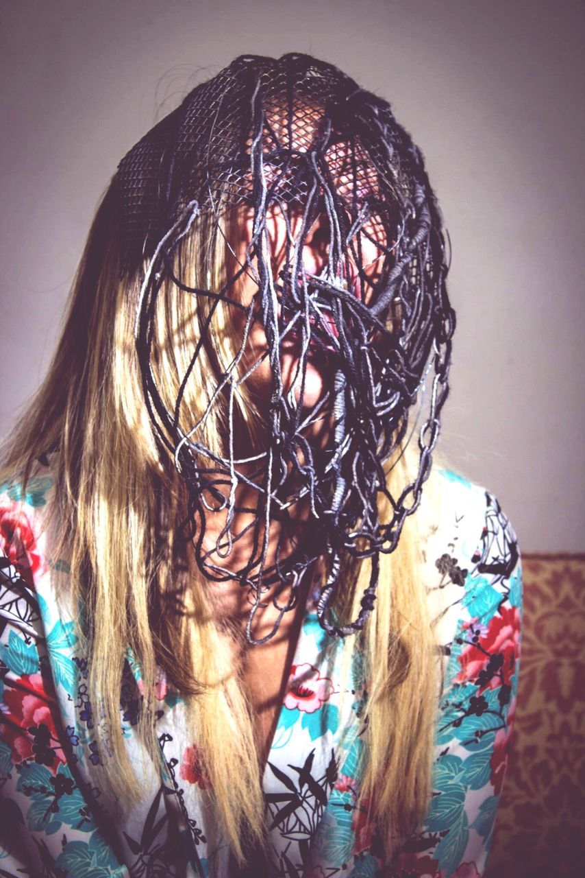 long hair, headshot, close-up, young adult, mask - disguise, person, multi colored, beauty, hairstyle, messy, studio shot, human face