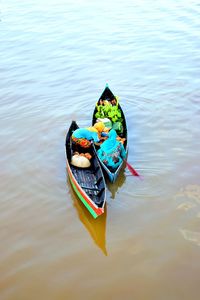 High angle view of boat floating on lake