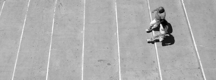 High angle view of man riding bicycle