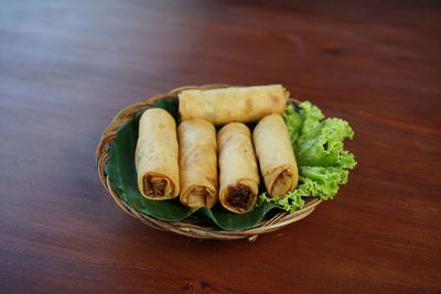 High angle view of vegetables in plate on table