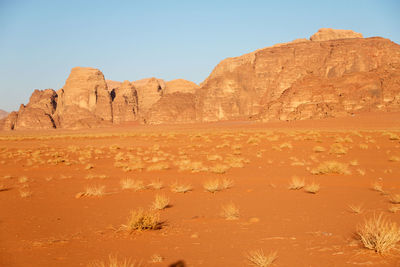 Rock formations in desert against sky